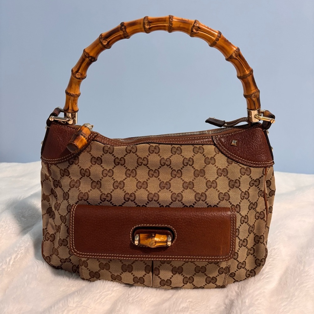 Gucci
Gucci Beige/Brown Canvas and Leather Bamboo Handle Top Handle Bag